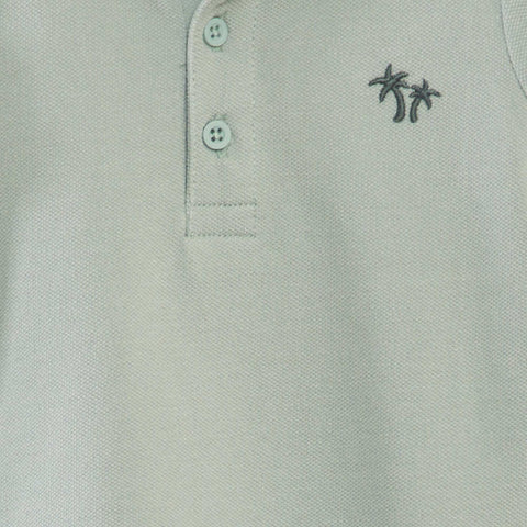 Polo en piqué de coton 'palmier'