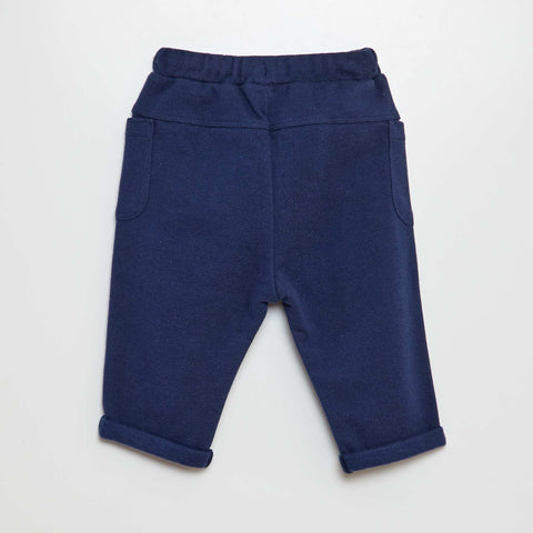 Pantalon en maille piquée avec poches plaquées