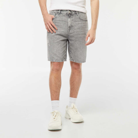 Bermuda en jean avec abrasions fantaisie