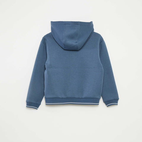 Sweat à capuche en matière douce