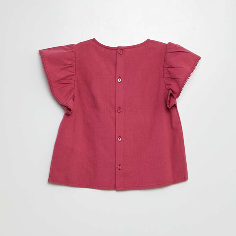 Blouse à manches courtes avec broderies