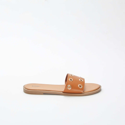 Mules plates avec brides à œillets