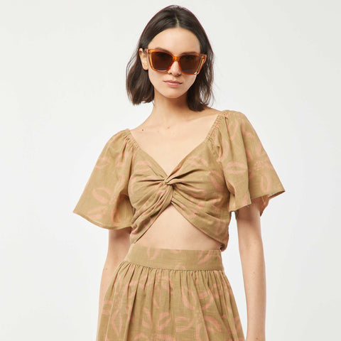 Blouse cropped avec noeud fantaisie et manches forme papillon