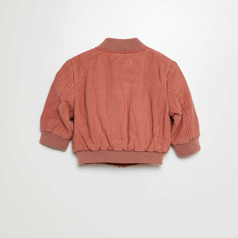 Veste matelassée pressionnée
