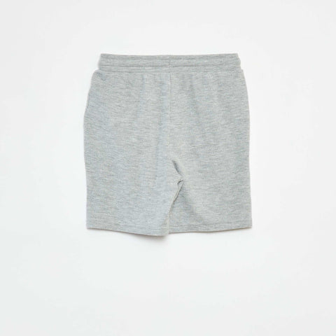 Short uni en maille gaufrée