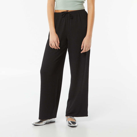 Pantalon large en maille crêpée