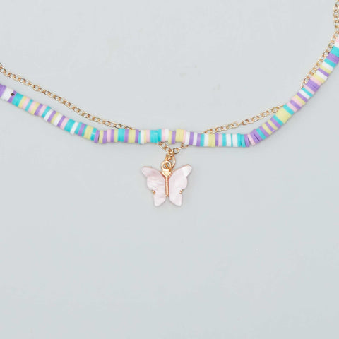 Collier multi-rangs perles et papillon