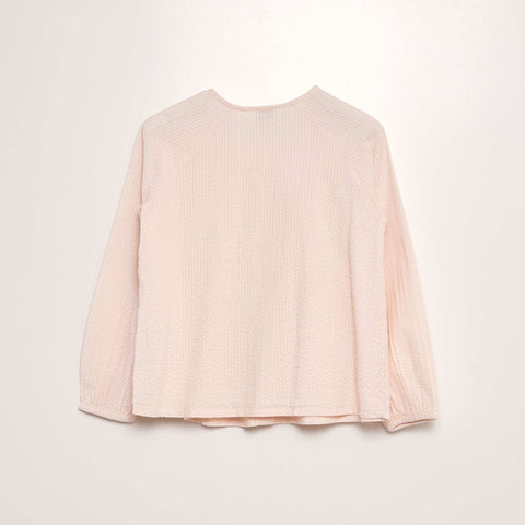 Blouse unie en maille gaufrée