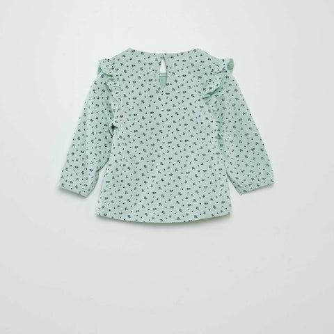 Blouse à motif avec volants aux épaules