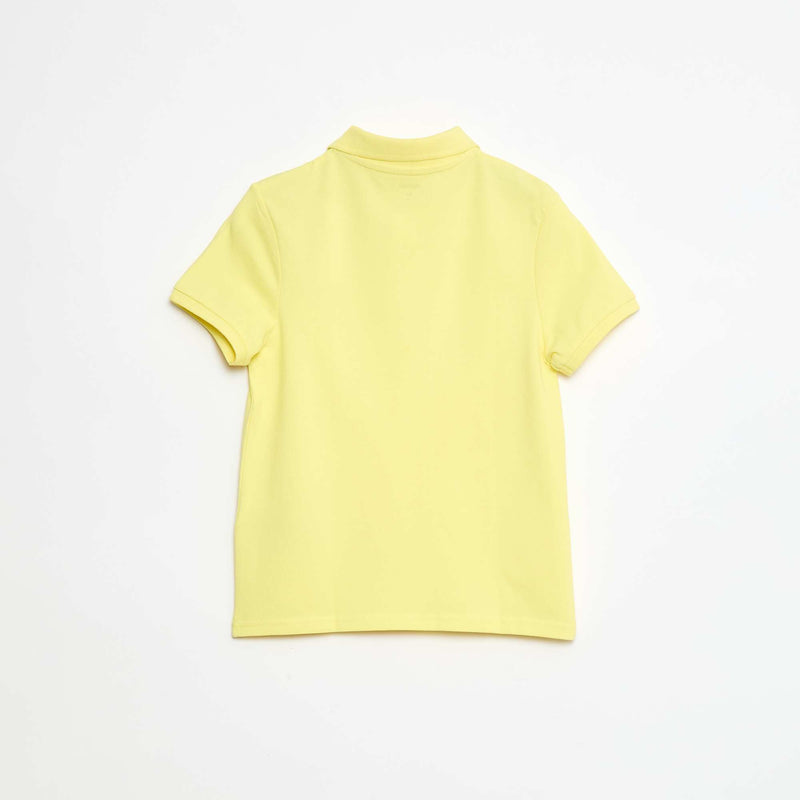 Polo uni en maille piquée