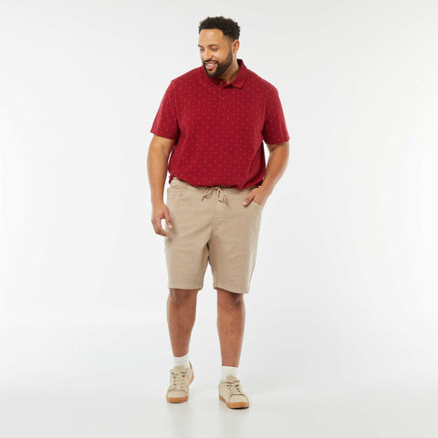 Polo à motifs en maille piquée
