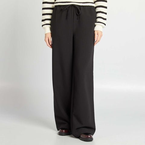 Pantalon large avec taille élastique et cordons de serrrage