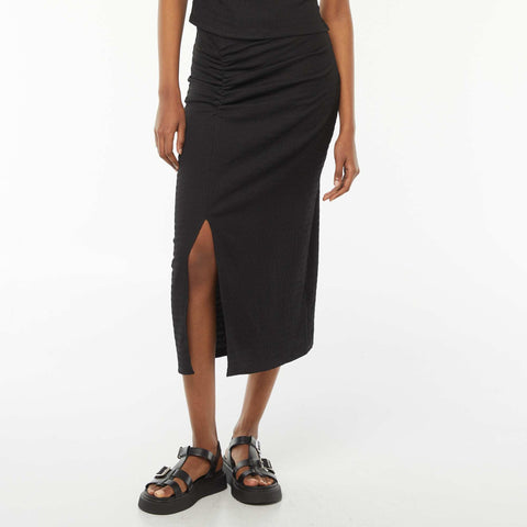 Jupe longue unie en matière crêpée