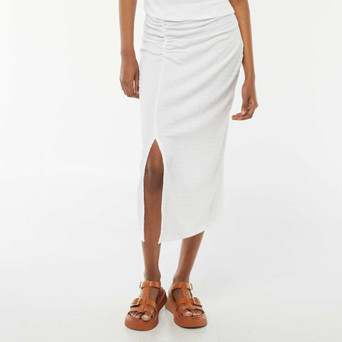 Jupe longue unie en matière crêpée