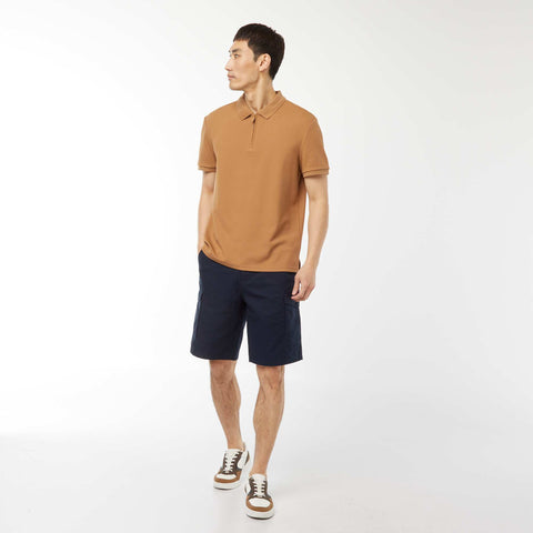 Polo en nid d'abeilles et col zippé