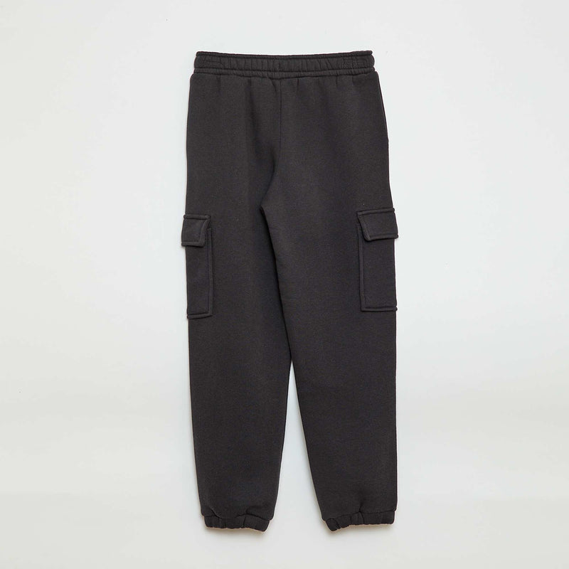 Jogging en molleton uni multi-poches