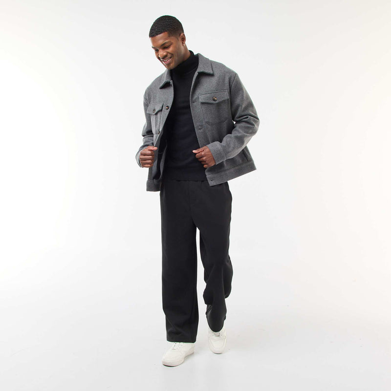 Pull col roulé uni
