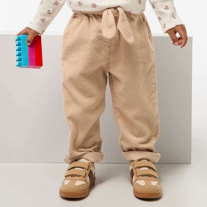 Pantalon paperbag en velours côtelé