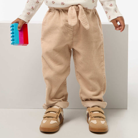 Pantalon paperbag en velours côtelé