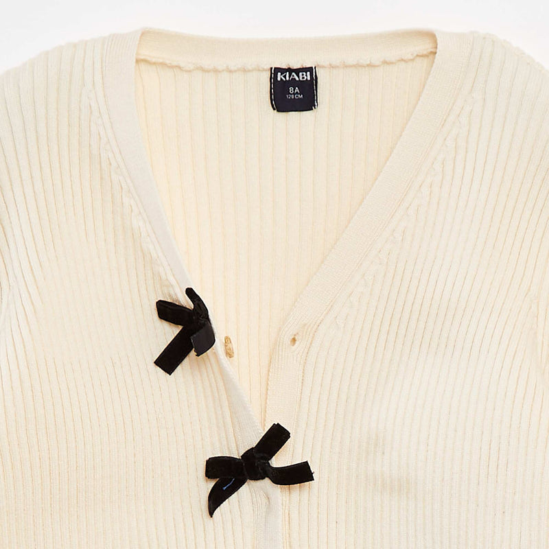 Gilet côtelé avec nœuds en velours