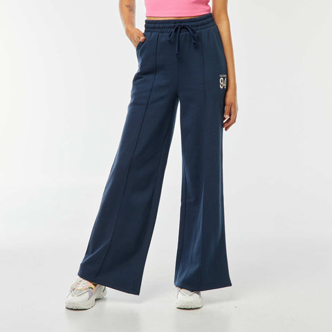 Jogging large avec imprimé sportswear