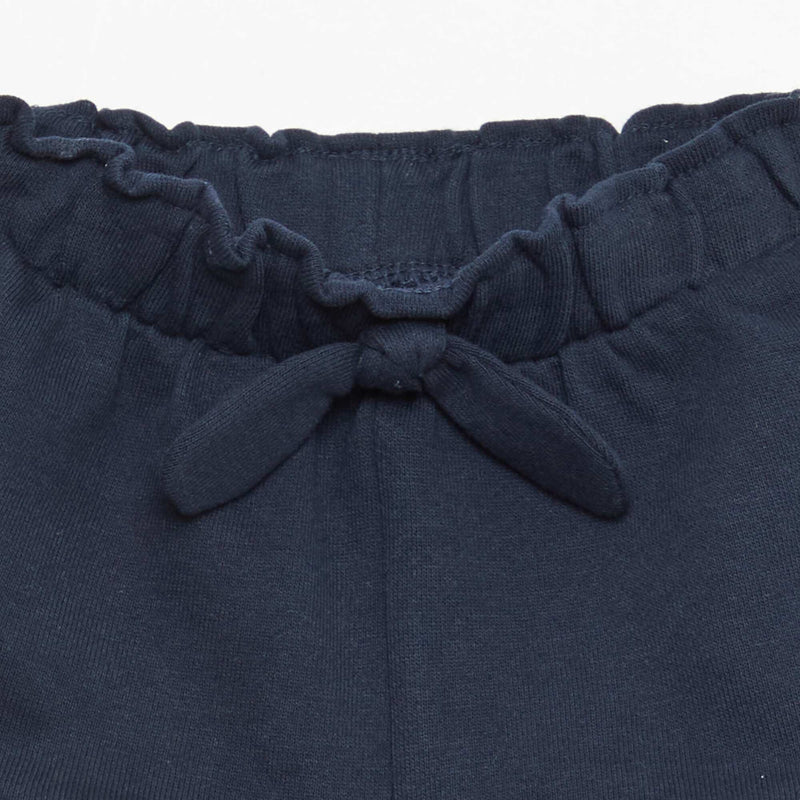 Short volanté avec nœud à la taille