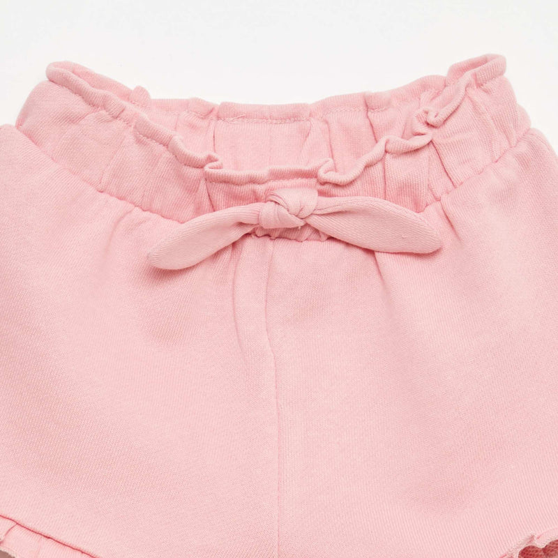 Short volanté avec nœud à la taille