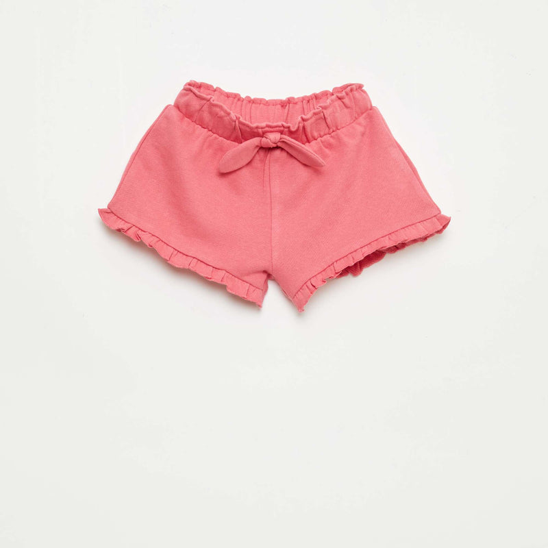 Short volanté avec nœud à la taille