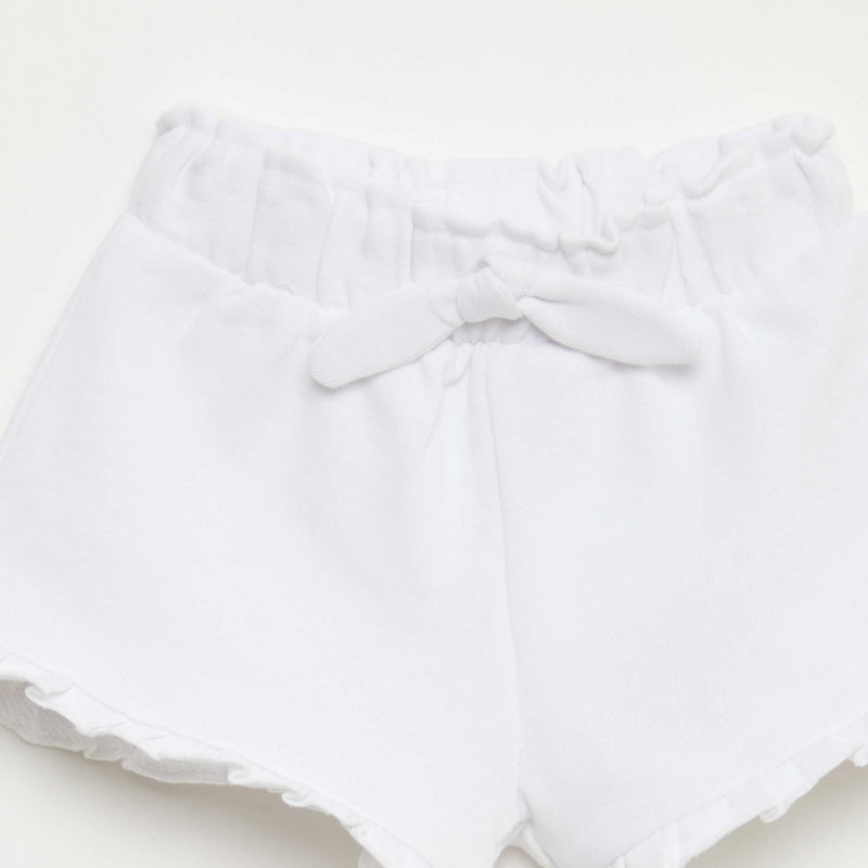 Short volanté avec nœud à la taille