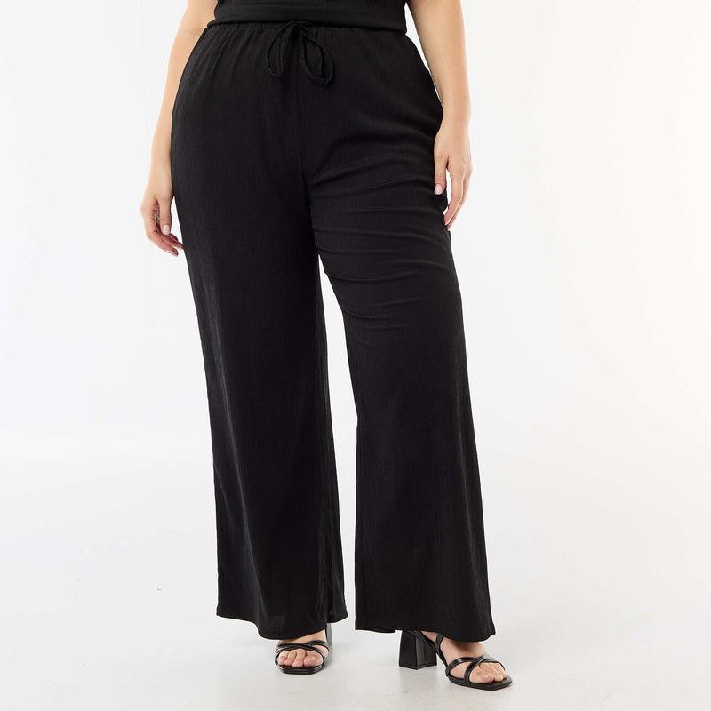 Pantalon large en maille crêpée