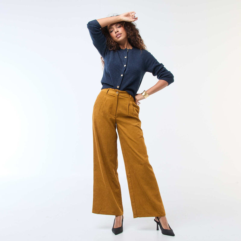 Gilet en maille avec boutons dorés