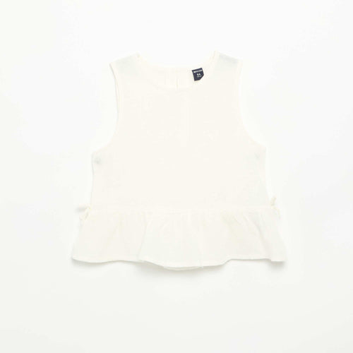 Blouse peplum  avec nœuds fantaisies