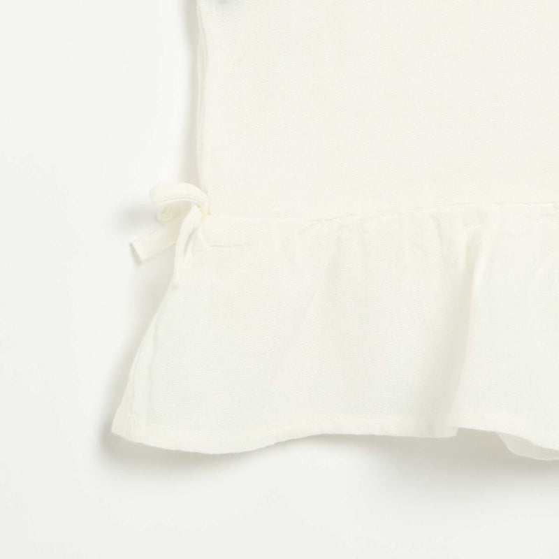 Blouse peplum  avec nœuds fantaisies