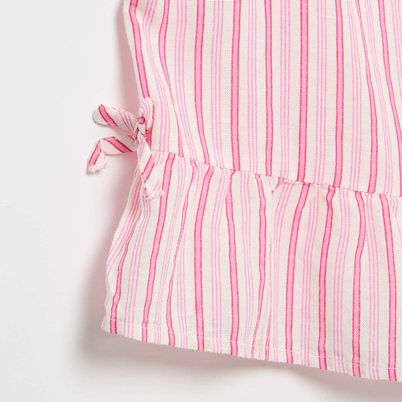 Blouse peplum  avec nœuds fantaisies