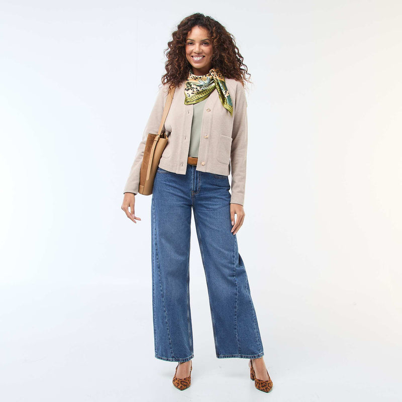 Gilet avec ouverture boutonnée dorée