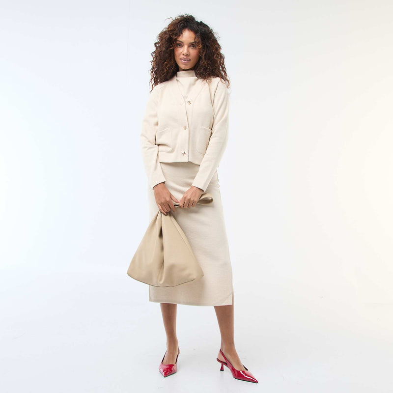 Gilet avec ouverture boutonnée dorée