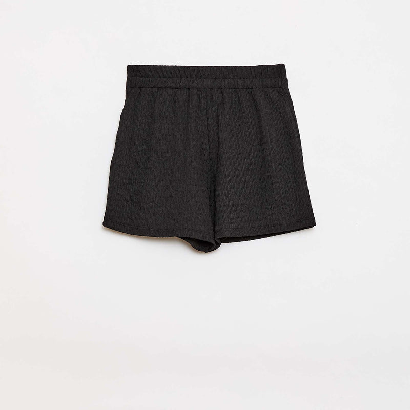 Jupe-short courte en maille légère unie