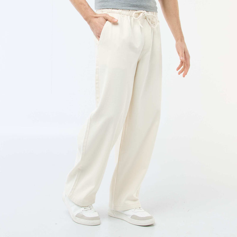 Jean coupe large avec taille élastiquée