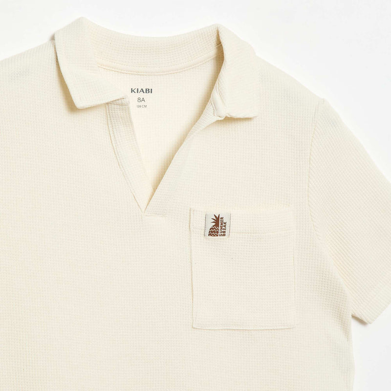 Polo en matière en nid d'abeilles