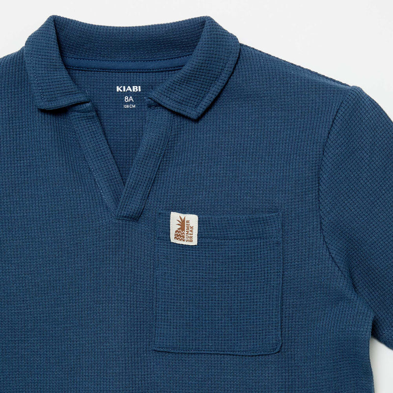Polo en matière en nid d'abeilles
