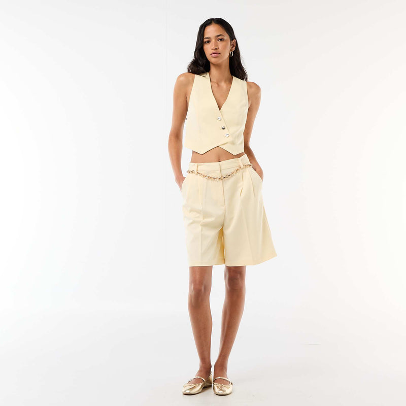 Gilet de costume avec ouverture boutonnée asymétrique