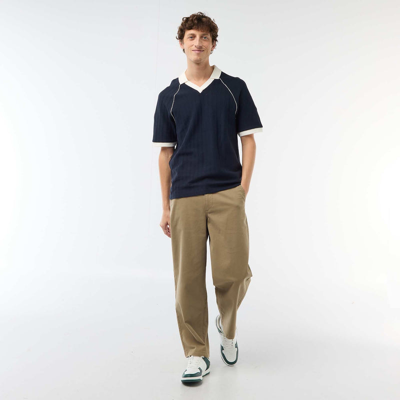 Polo en matière fantaisie col polo sans boutons