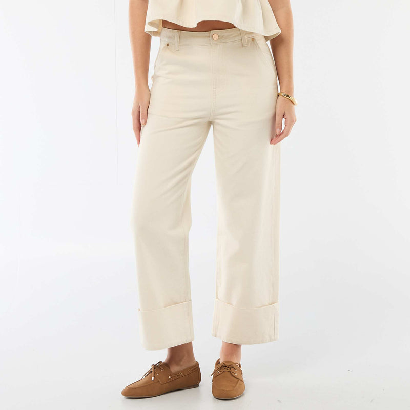 Jean taille haute avec revers en bas