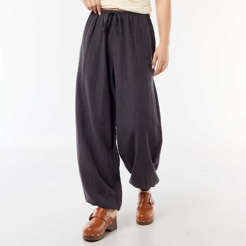 Pantalon large uni ceinture élastiquée