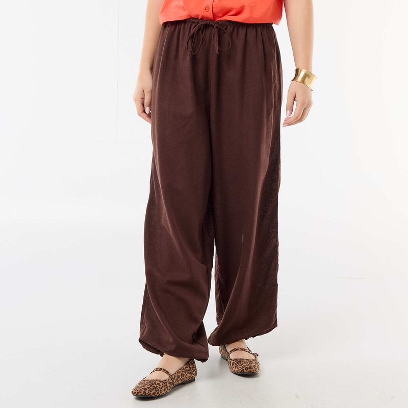 Pantalon large uni ceinture élastiquée