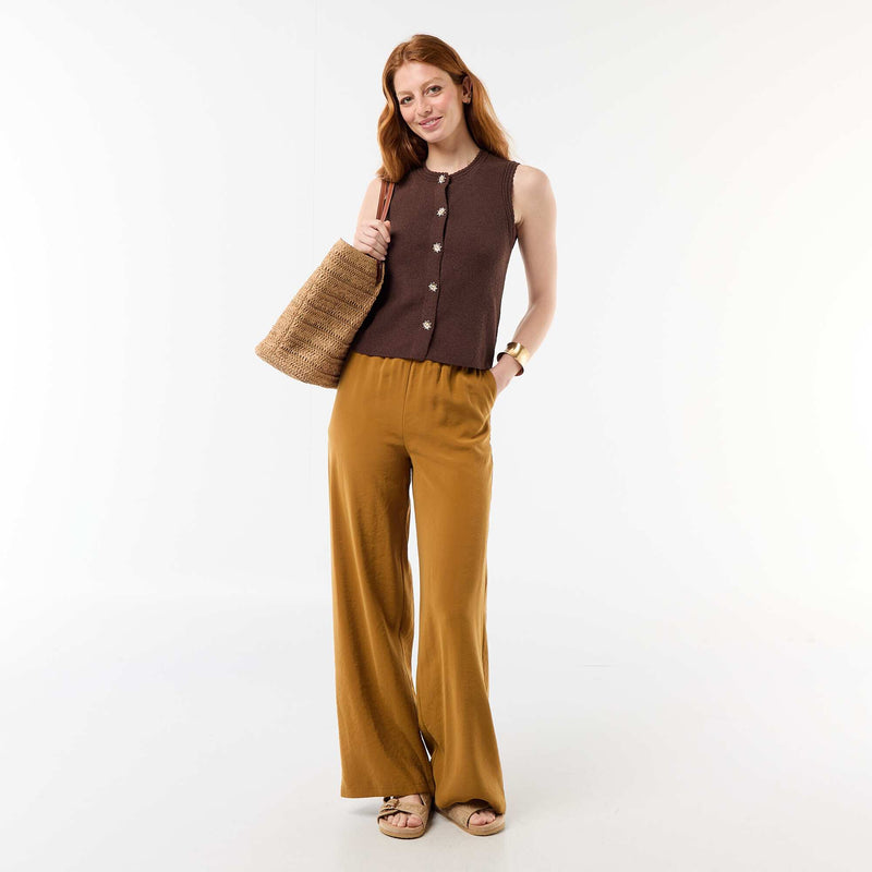 Top sans manches avec boutons dorés