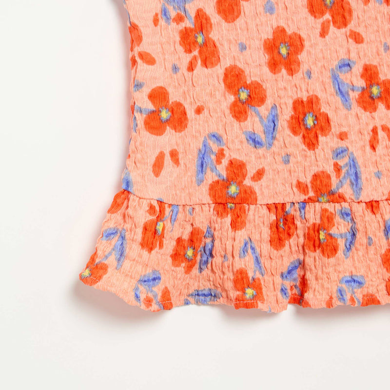 Blouse gaufrée sans manches