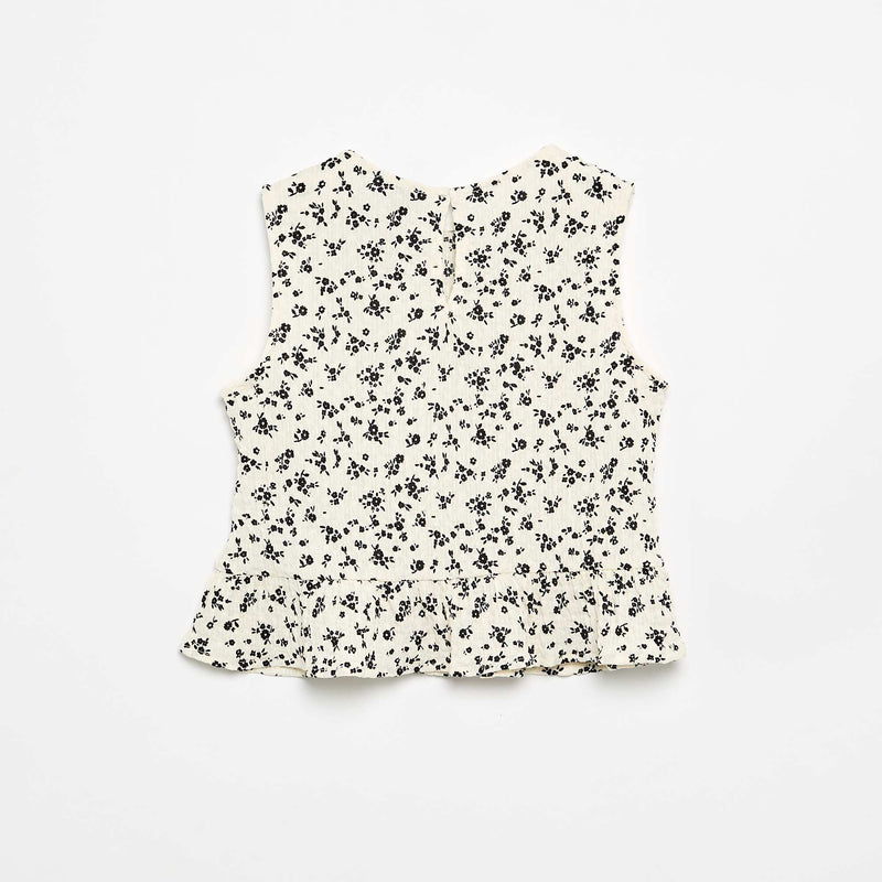 Blouse gaufrée sans manches