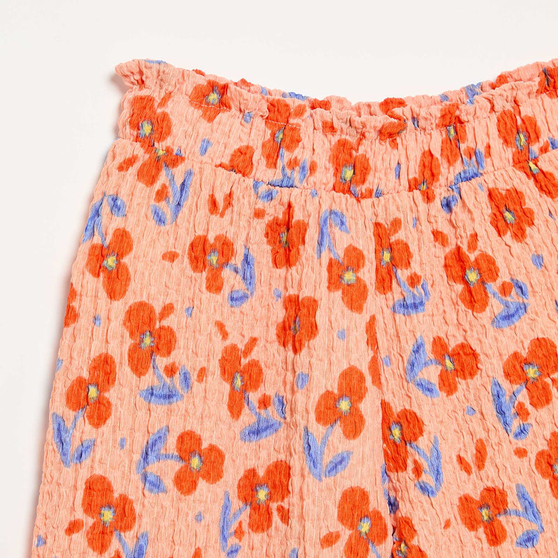 Pantalon large avec bas volantés