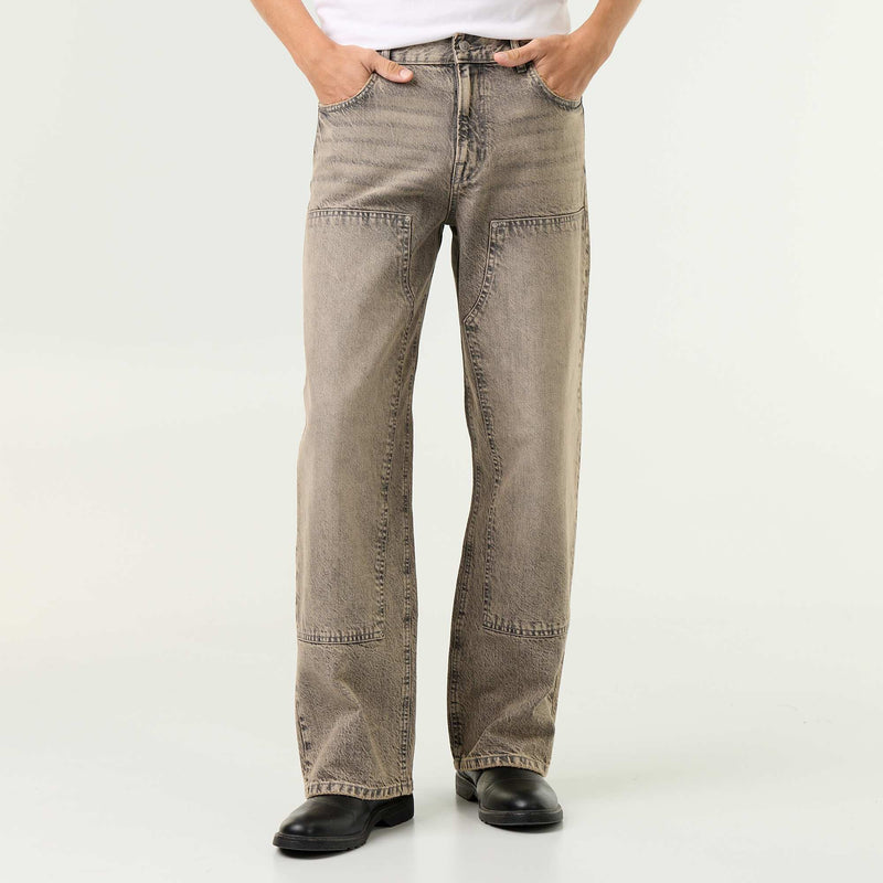 Jean baggy uni avec empiècements fantaisies
